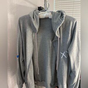 Gray graphic Zip-Up Hoodie Sweater! Size XL Never Worn! Open to offers